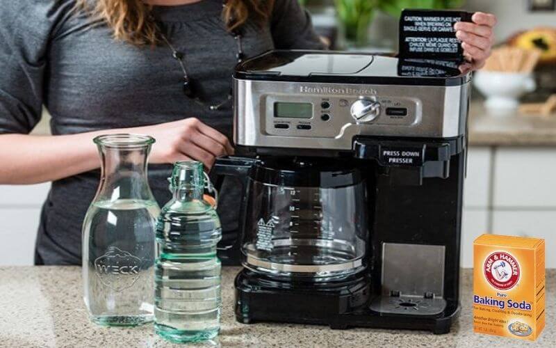 cleaning coffee pot with ice and salt