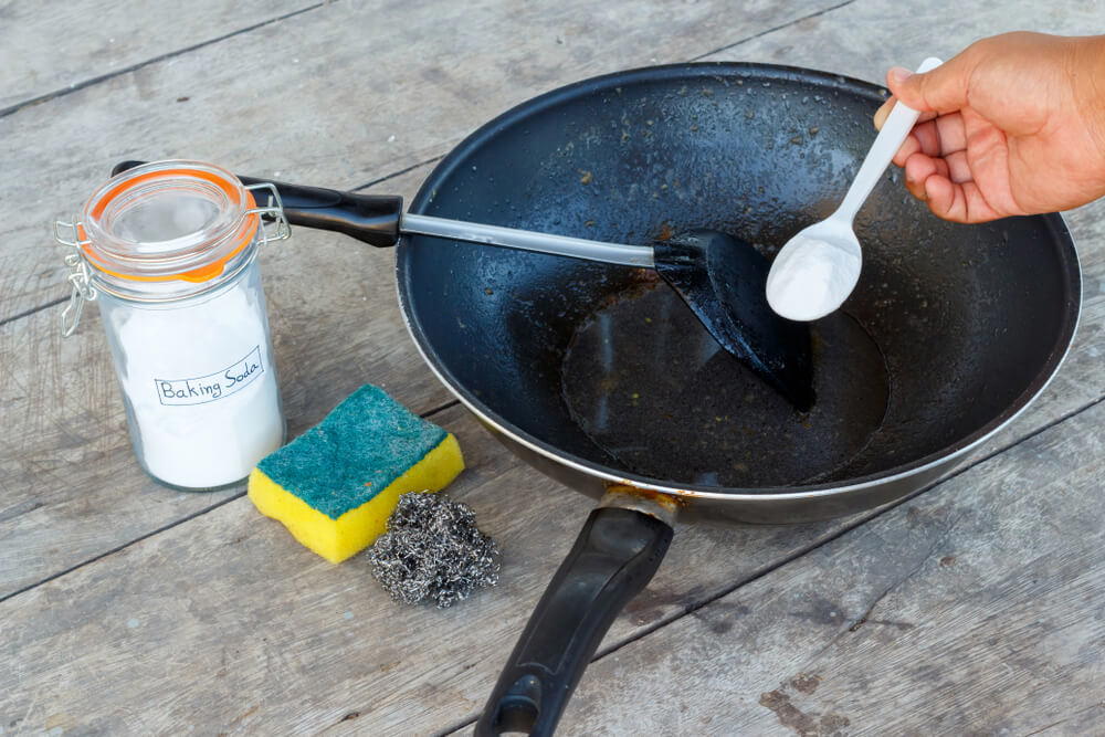 How to Clean a Cast Iron Pan With Baking Soda and Elbow Grease - Delishably