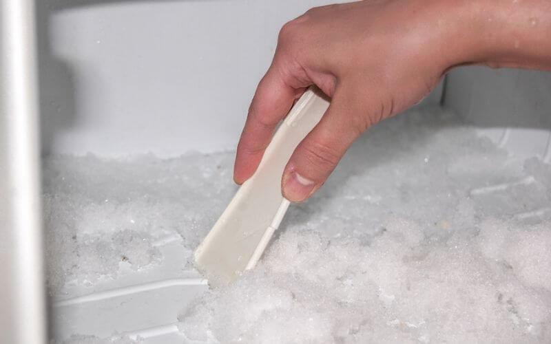 defrost a freezer quickly