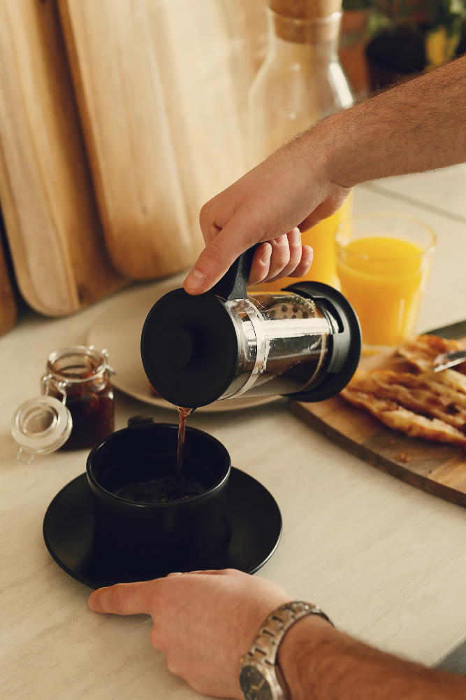 Pouring coffee into cup