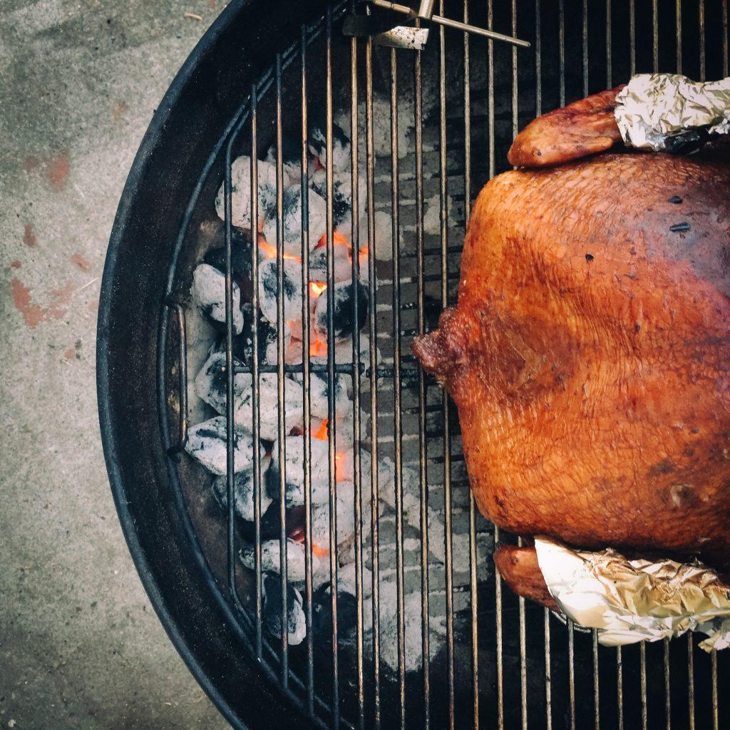 Smoked turkey on bbq grill during the holidays